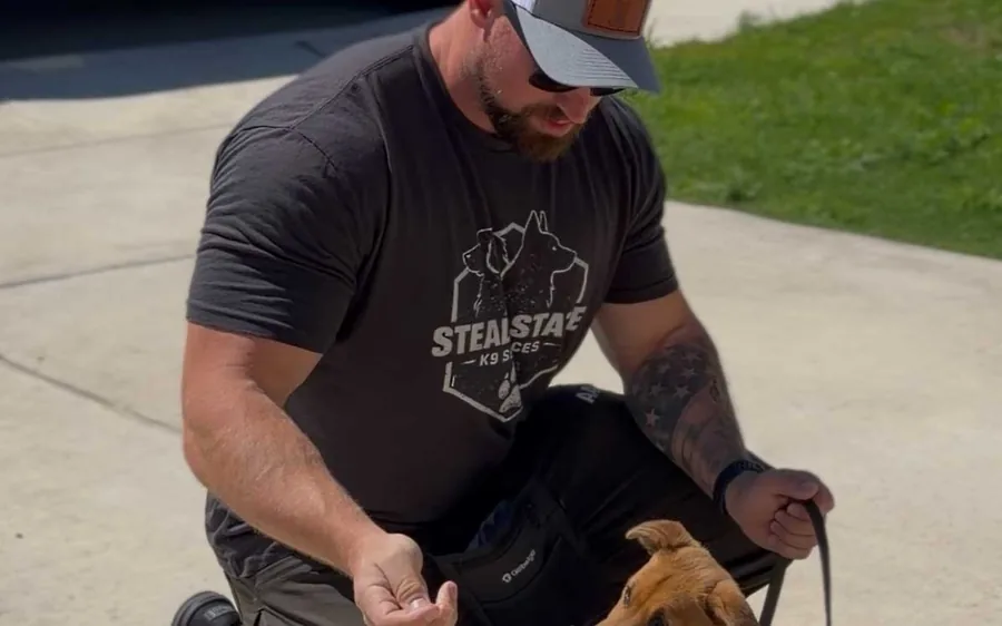 Kyle working one on one with a dog during a board and train program